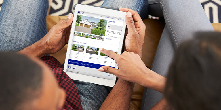 home-builder-design-membership couple on ipad